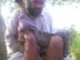 Mature aunty indulges in open-air public