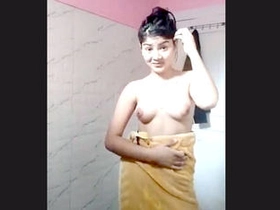 Cute teenage woman reveals her naked