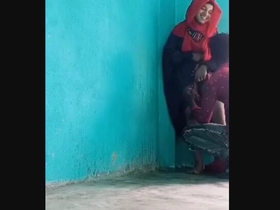 A Muslim girl in a hijab gets drilled